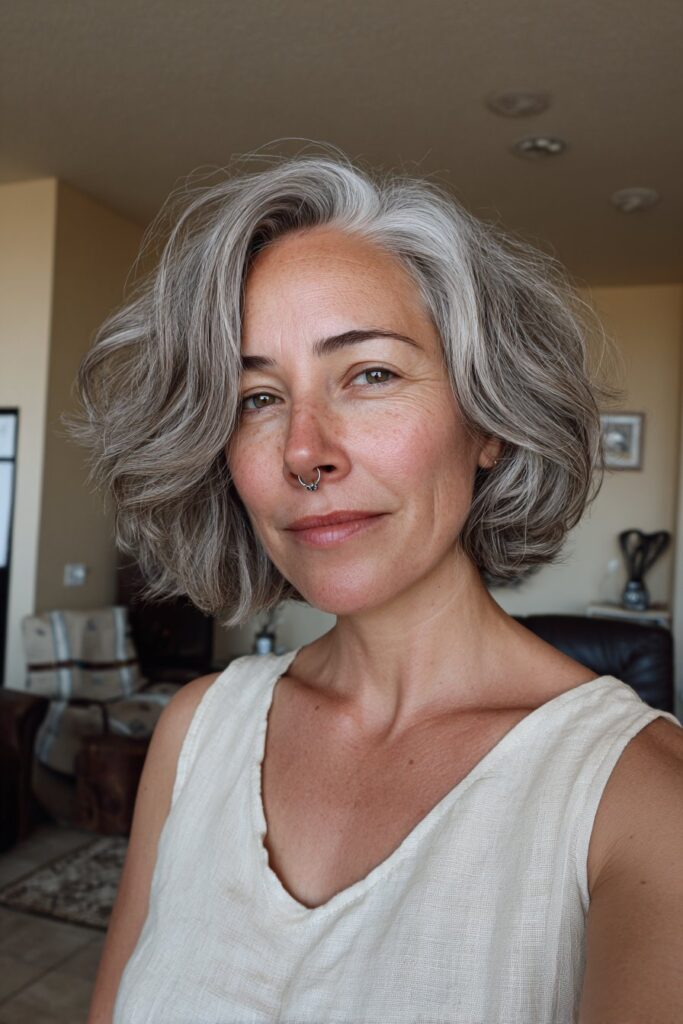 12 Choppy Hairstyles for Older Women (Effortlessly Youthful) 10 Older woman with choppy wolf cut