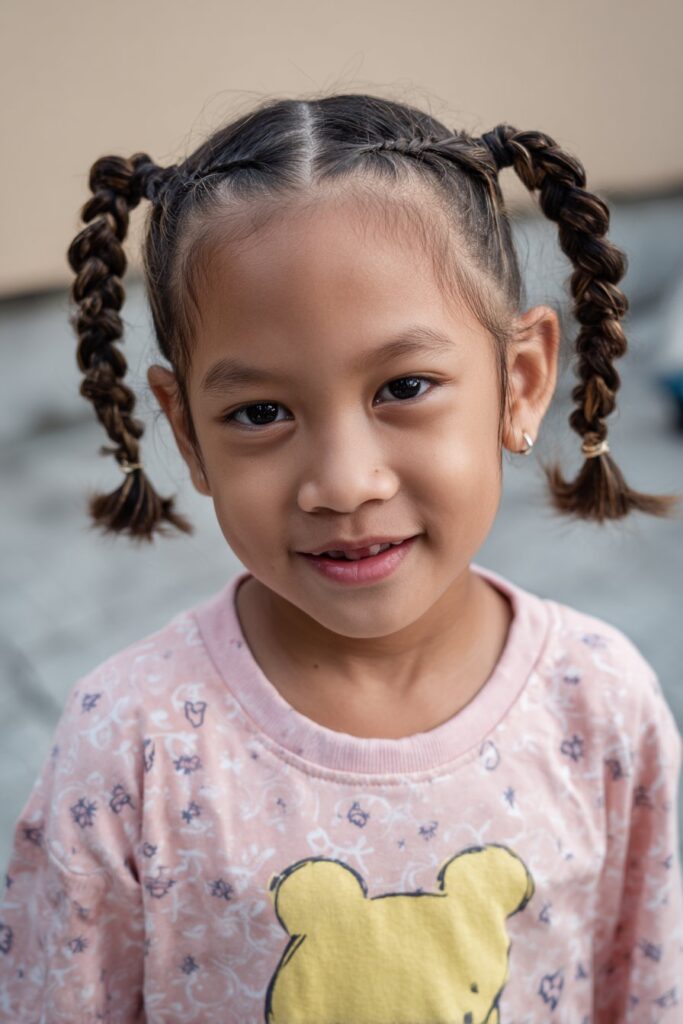 2 braided ponytails for kids criss cross braids