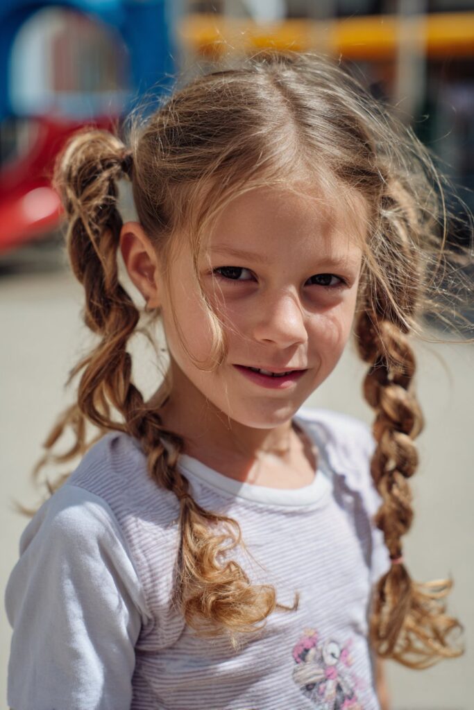 2 braided ponytails for kids mixed texture braids