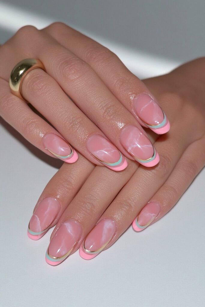 Pink and gold swirl nails
