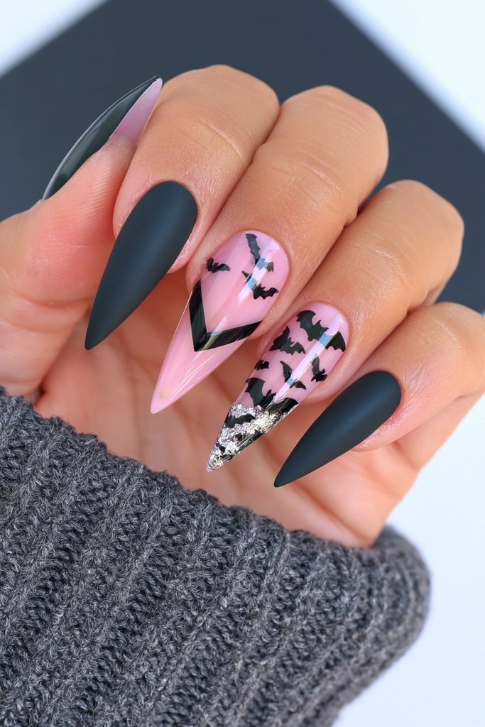25 Almond Halloween Nails That Are Spooky, Not Over-the-Top 21 Bat silhouette accent nails