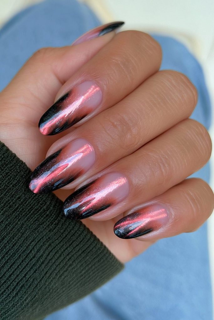 25 Almond Halloween Nails That Are Spooky, Not Over-the-Top 2 Black red cat-eye gradient almond nails