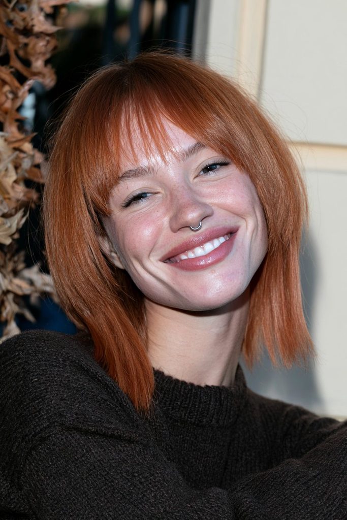 Bright copper jellyfish haircut with bold dimensional layered contrast