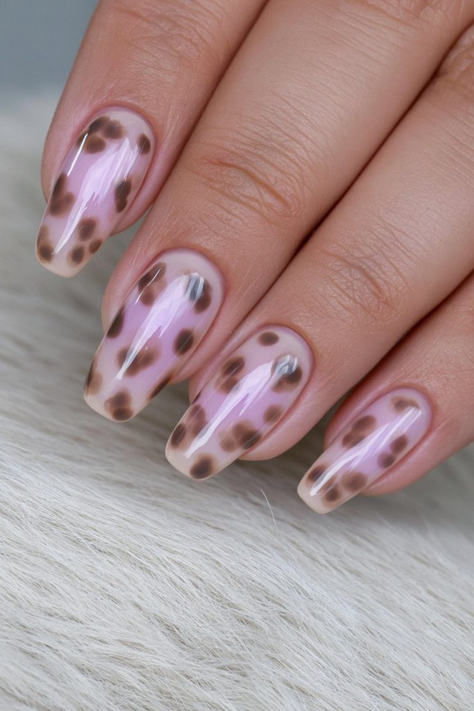 Chocolate brown nails with playful contrasting polka dots