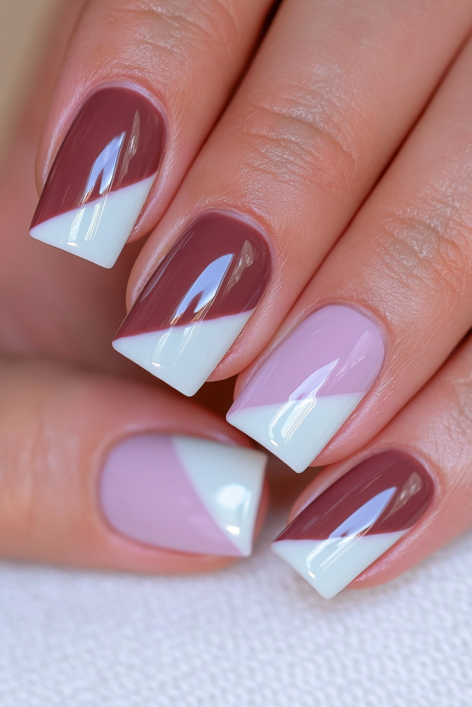 Chocolate and white two-tone nails with bold contrast