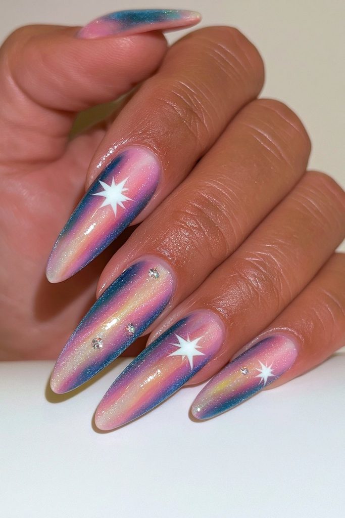 Deep blue velvet nails with sparkling crystal star accents
