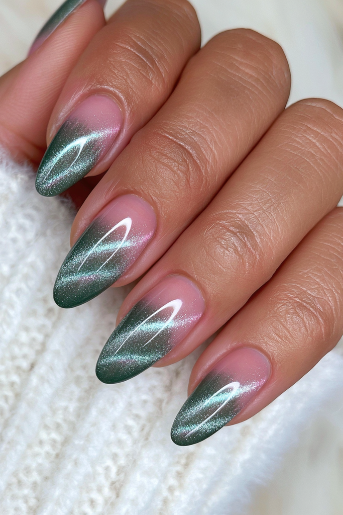 Deep green velvet nails with rich glowing dimension