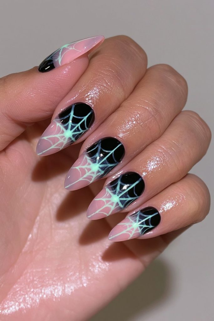 25 Almond Halloween Nails That Are Spooky, Not Over-the-Top 18 Glow-in-the-dark spider accent nails