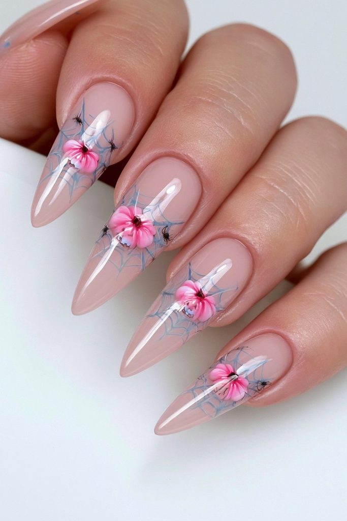 20 Pink Halloween Nails For This Spooky Season 16 Glowing pink pumpkin spiderweb nails