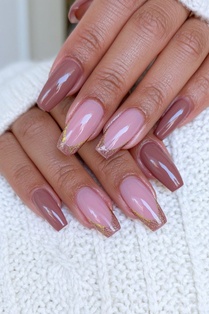 Chocolate nails combining solid polish and French tip designs