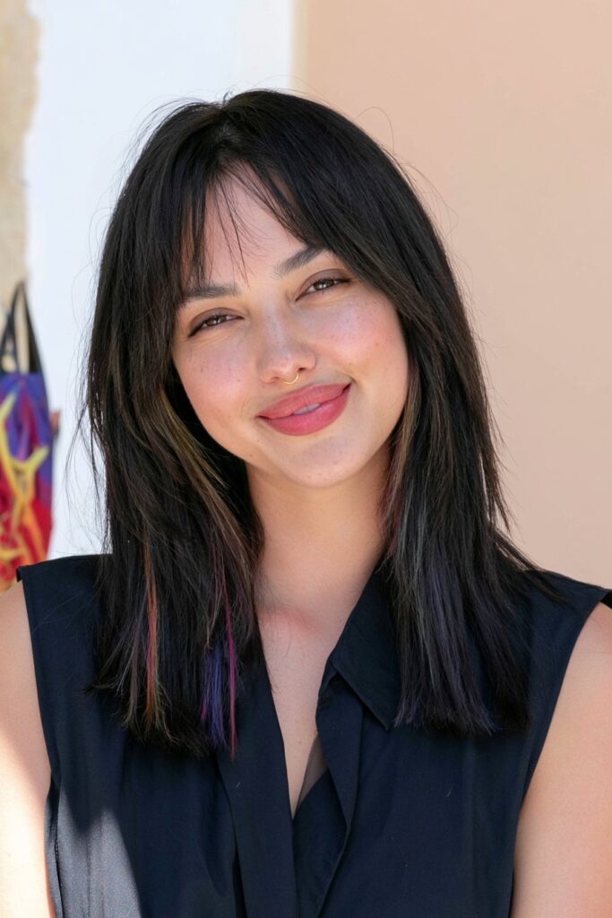 Long wolf cut with rainbow streaks