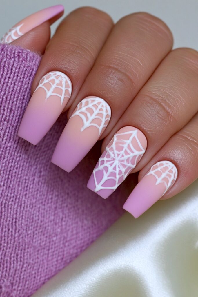 Pink ombré spider web nails