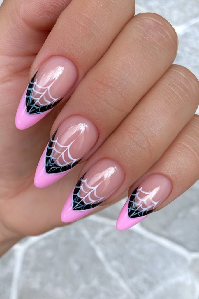 Pink and black spider web French tips