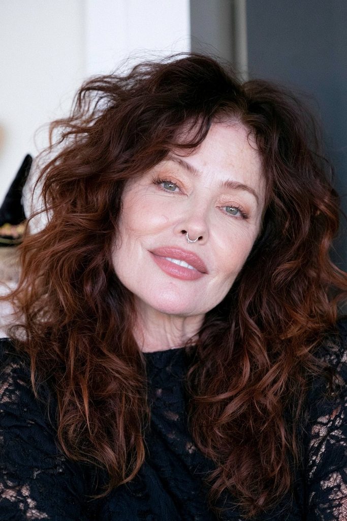 Root-lifted loose curls with witchy accessories