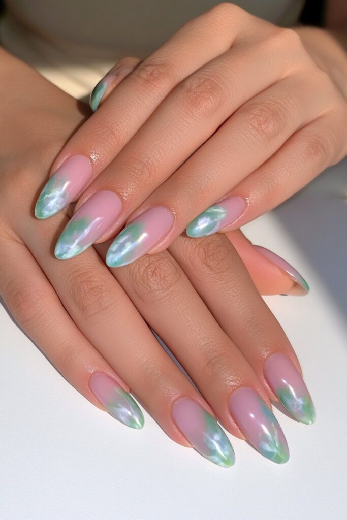 Sage green marble almond nails