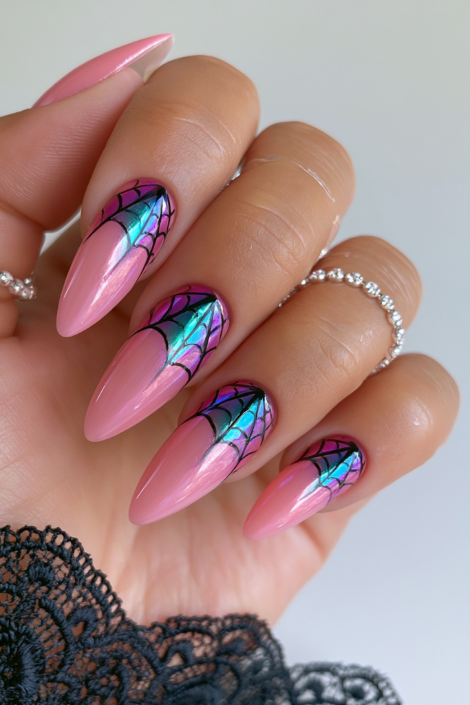 Silver chrome web over pink nails
