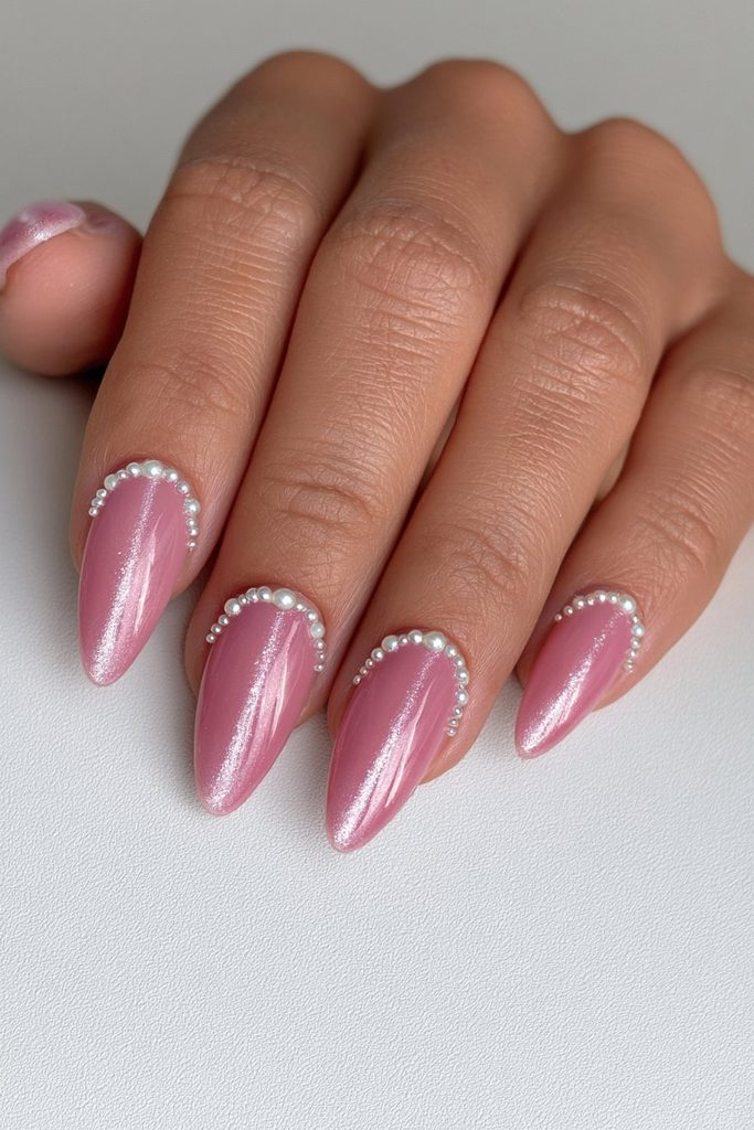 Nude velvet nails decorated with delicate small beads