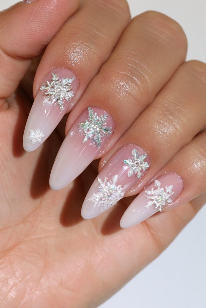 20 Glamorous Snowflake Nail Ideas to Sparkle Through Winter 5 3D snowflake charm nail accents