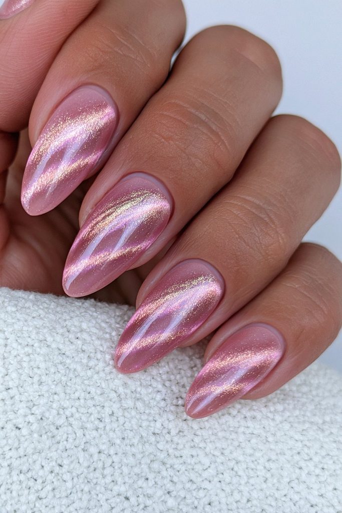 Bronze shimmer cat-eye nails with warm metallic autumn glow