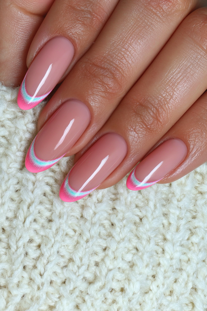 Sheer neutral nails with glowing cat-eye French tips