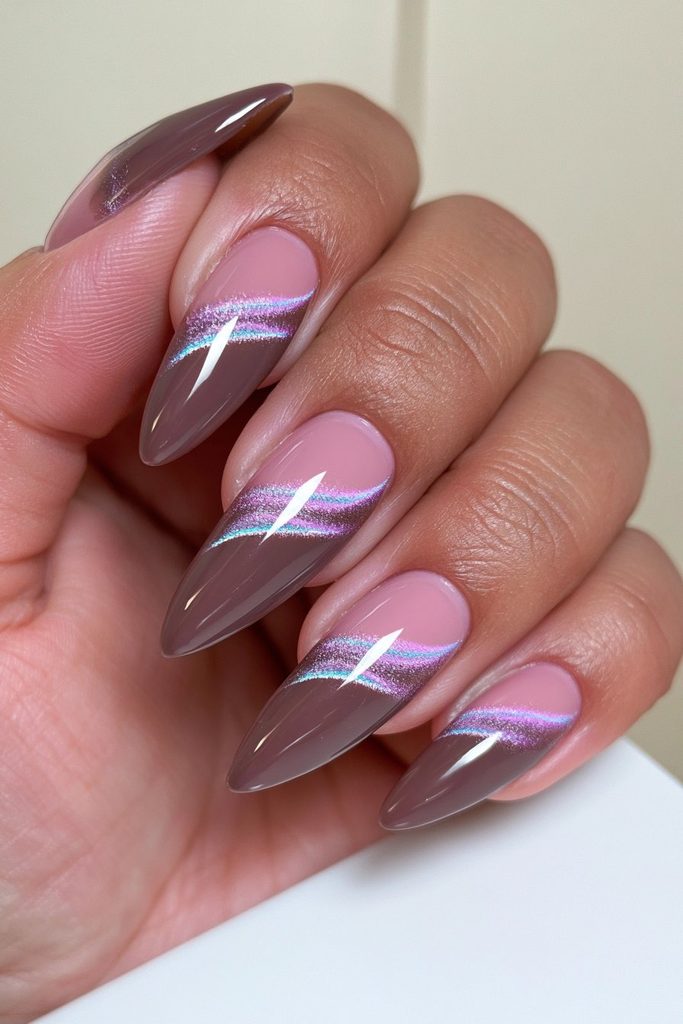 Charcoal cat-eye almond nails with smoky magnetic shimmer