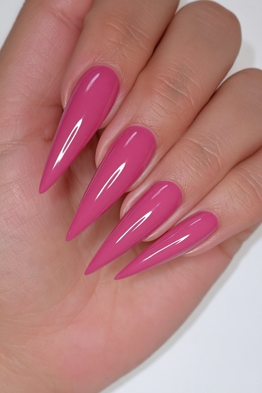 Classic red stiletto nails with bold glossy timeless finish