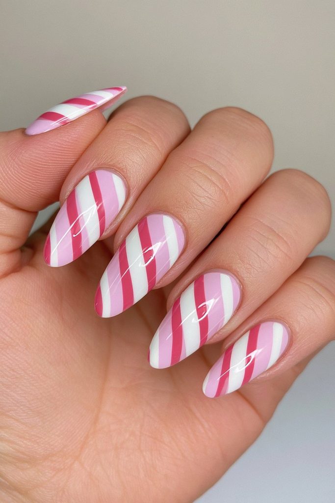 20 Candy Cane Nail Designs for Easy, Festive DIY Manicures 1 Classic red white candy cane stripes