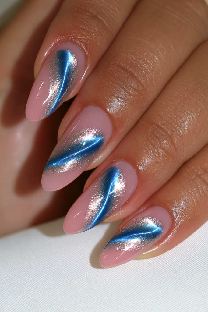 Bold cobalt cat-eye nails with intense electric magnetic shine