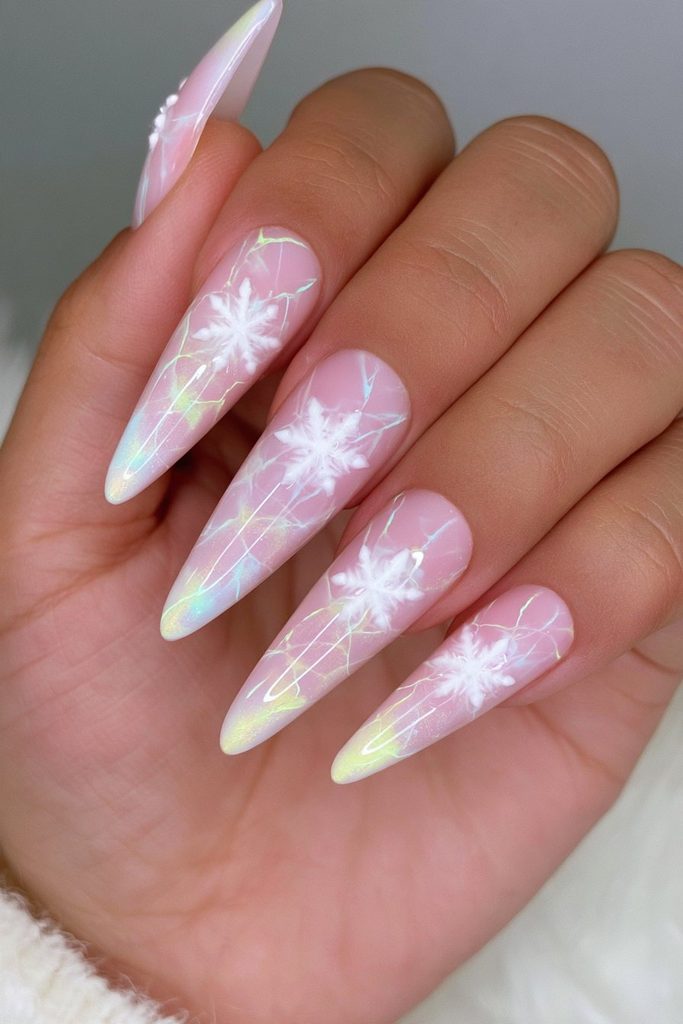Cracked ice nails featuring frosty snowflakes and textured winter details