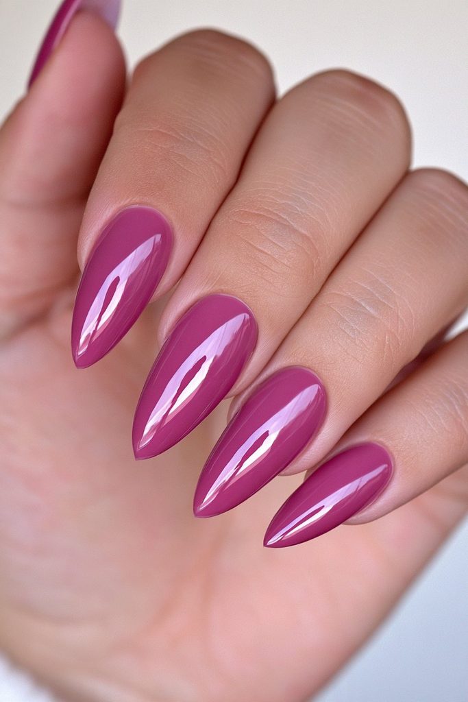 Elegant cranberry almond shaped nails