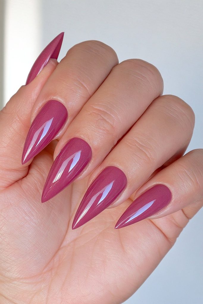 Dramatic cranberry stiletto pointed nails