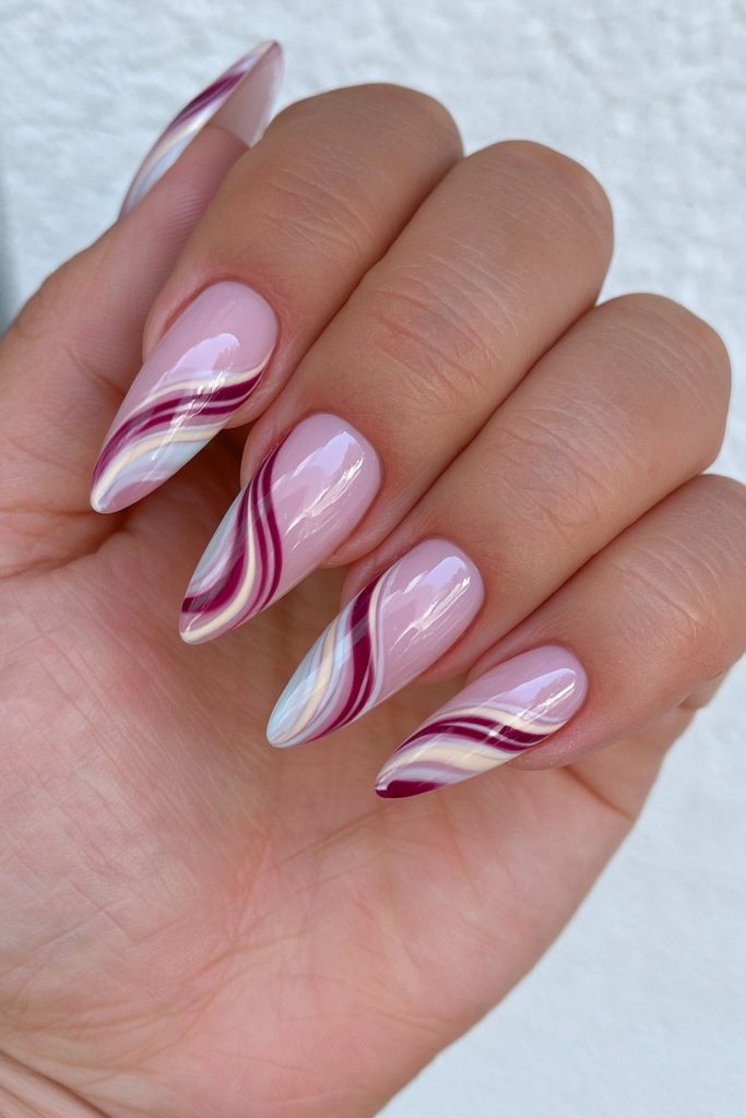 25 Cranberry Nail Ideas for a Rich, On-Trend Manicure 20 Flowing cranberry swirl nail art