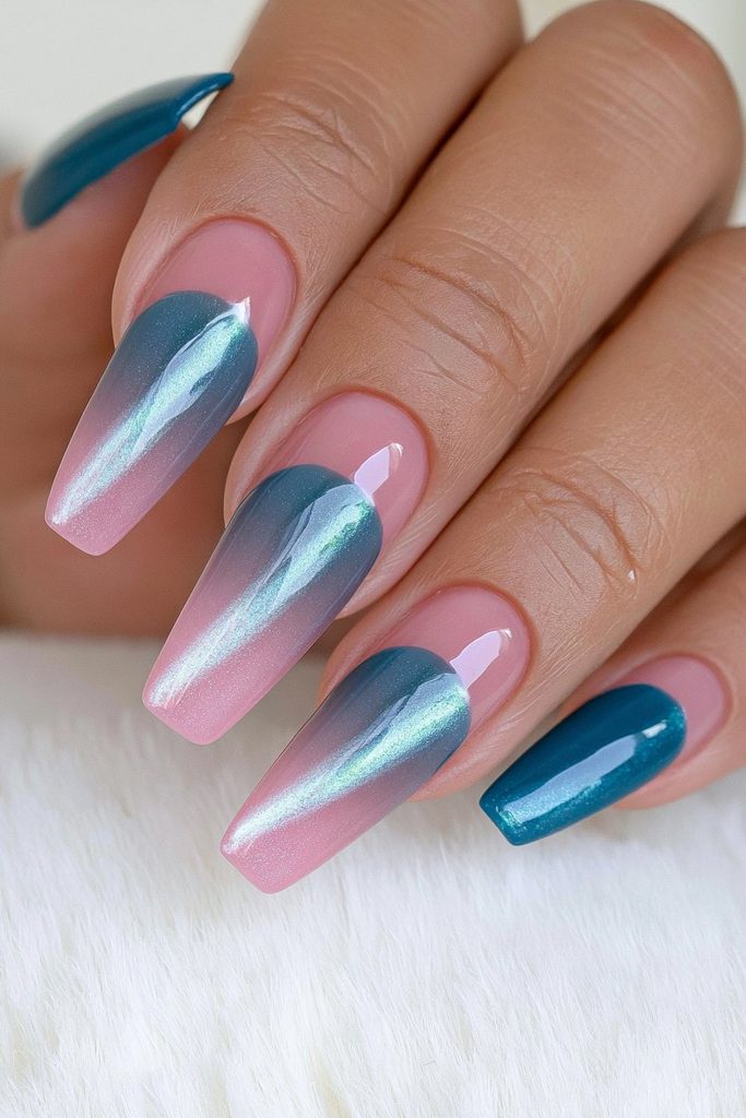 Deep teal cat-eye almond nails with rich dimensional shimmer