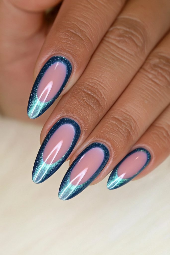 Deep teal cat-eye nails with rich oceanic magnetic shimmer