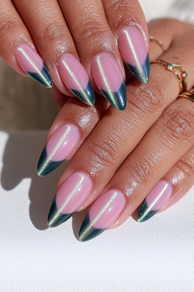 Emerald cat-eye nails with vibrant glowing magnetic dimension