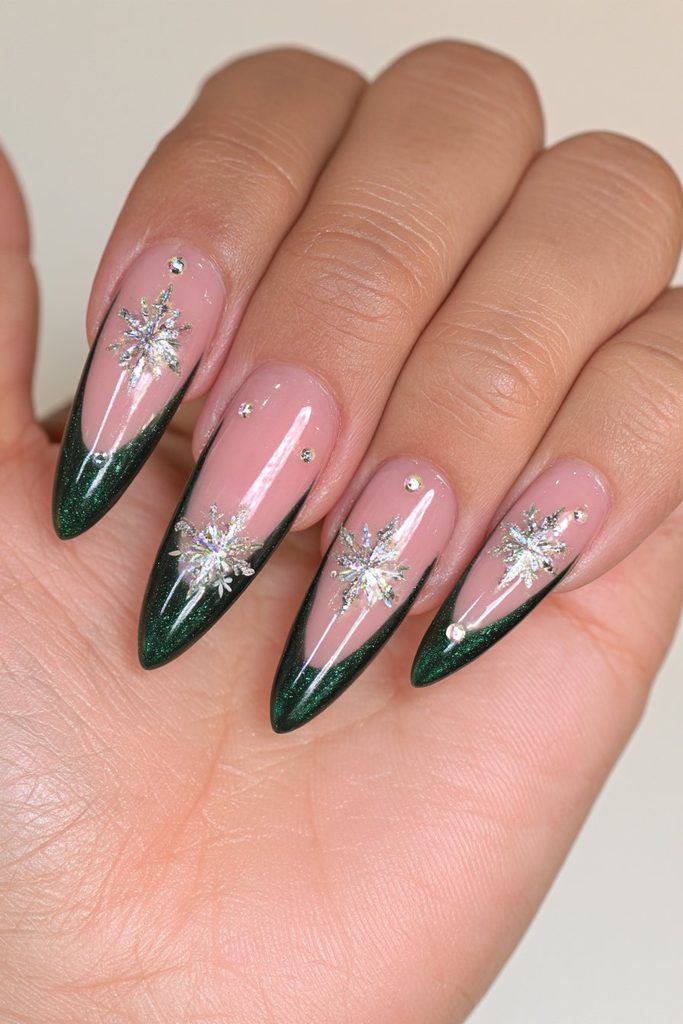 20 Glamorous Snowflake Nail Ideas to Sparkle Through Winter 11 Emerald green snowflake glam nails