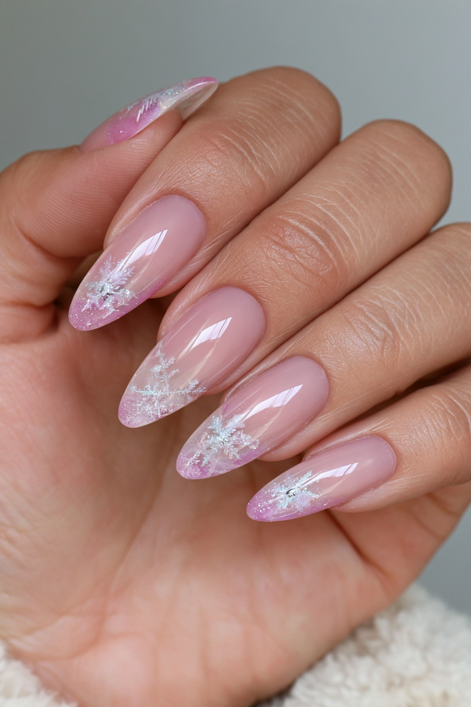 20 Glamorous Snowflake Nail Ideas to Sparkle Through Winter 3 Icy snowflakes on glass-effect nails