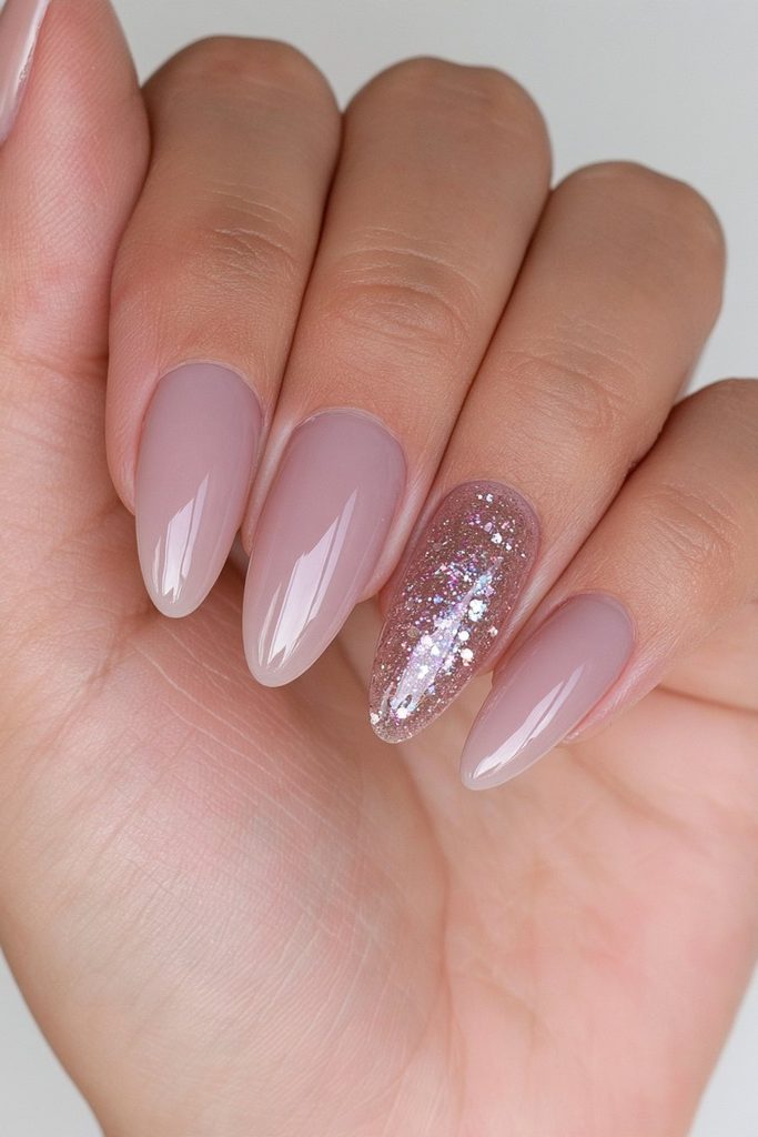 Gold glitter accent nail design