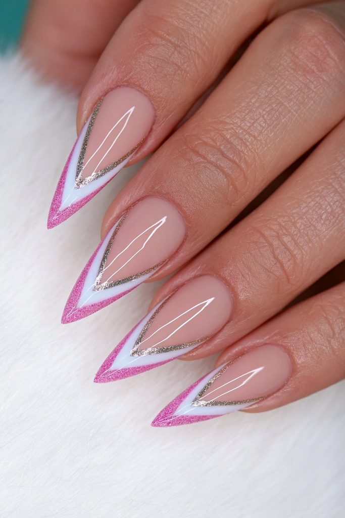 French stiletto nails with delicate luxurious gold lining