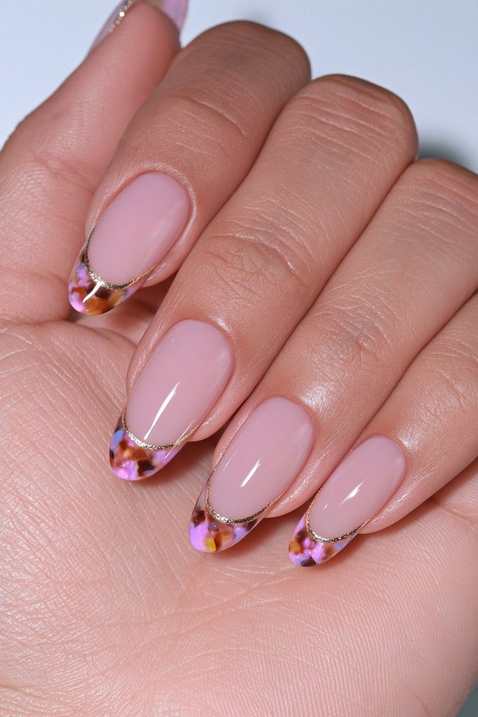 Gold outlined tortoiseshell French tips