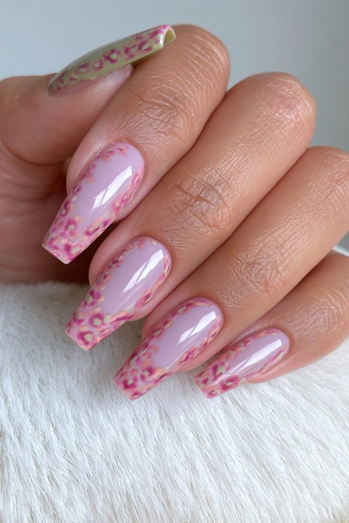 Green nails with stylish fawn-inspired animal print accents