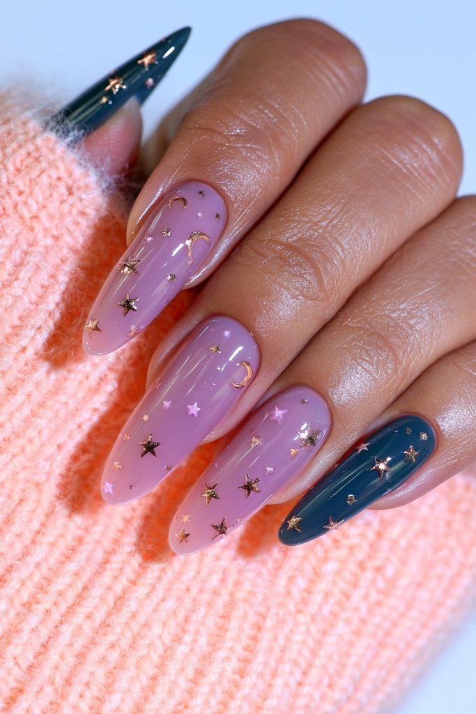 Green nails with delicate celestial stars and cosmic accents