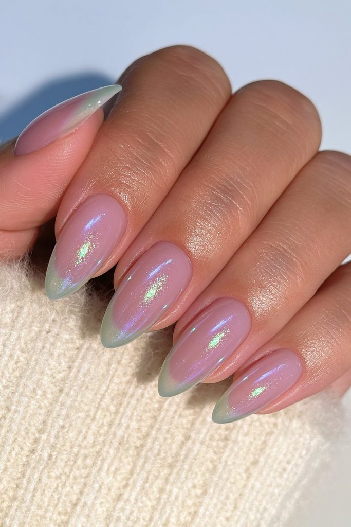 Green glazed donut nails with soft pearly reflective shine