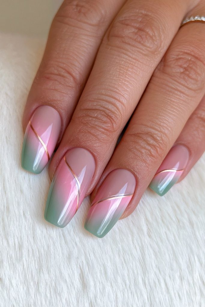 Green nails with delicate gold line accent details