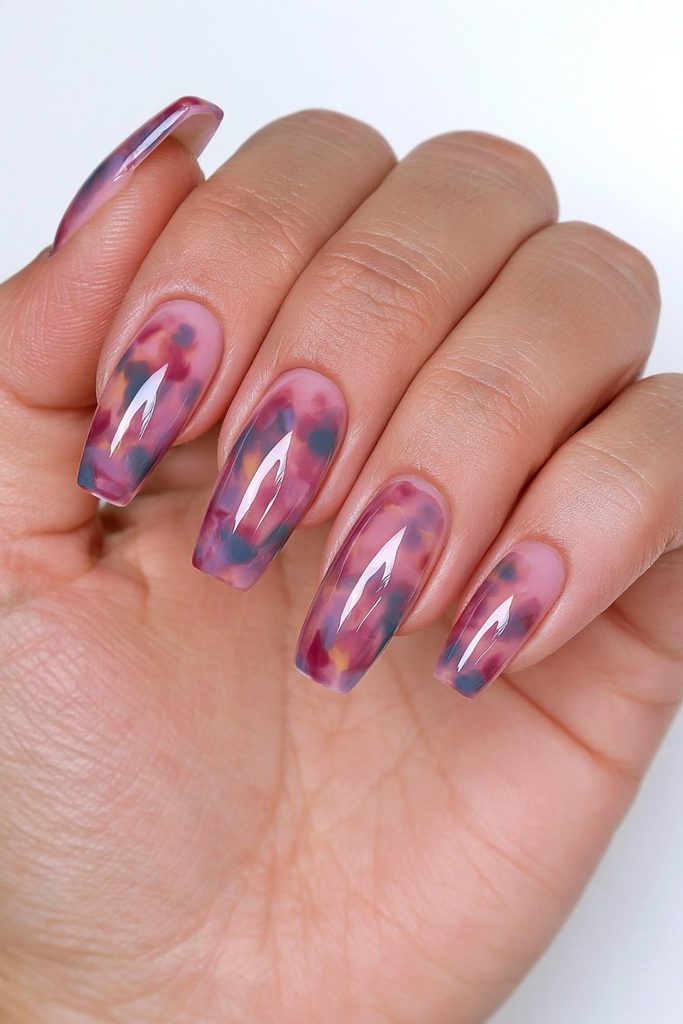 Jewel-tone tortoiseshell emerald nails