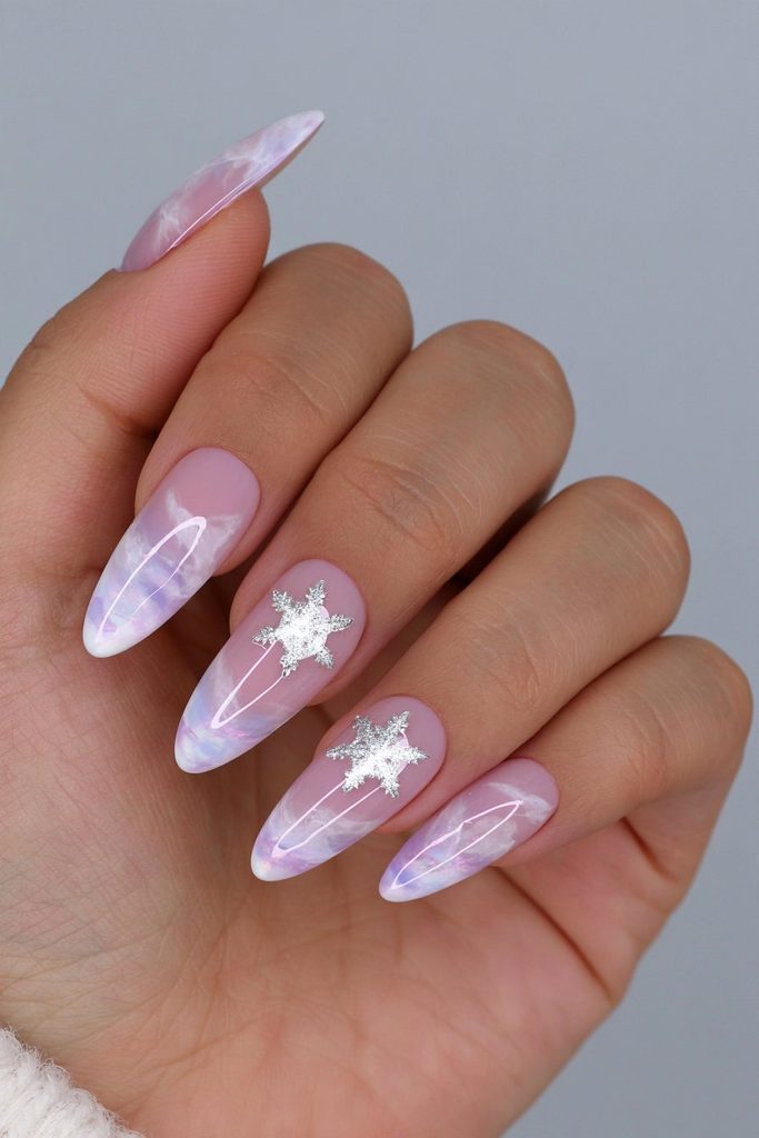 20 Glamorous Snowflake Nail Ideas to Sparkle Through Winter 15 Marbled snowflake swirl nail design