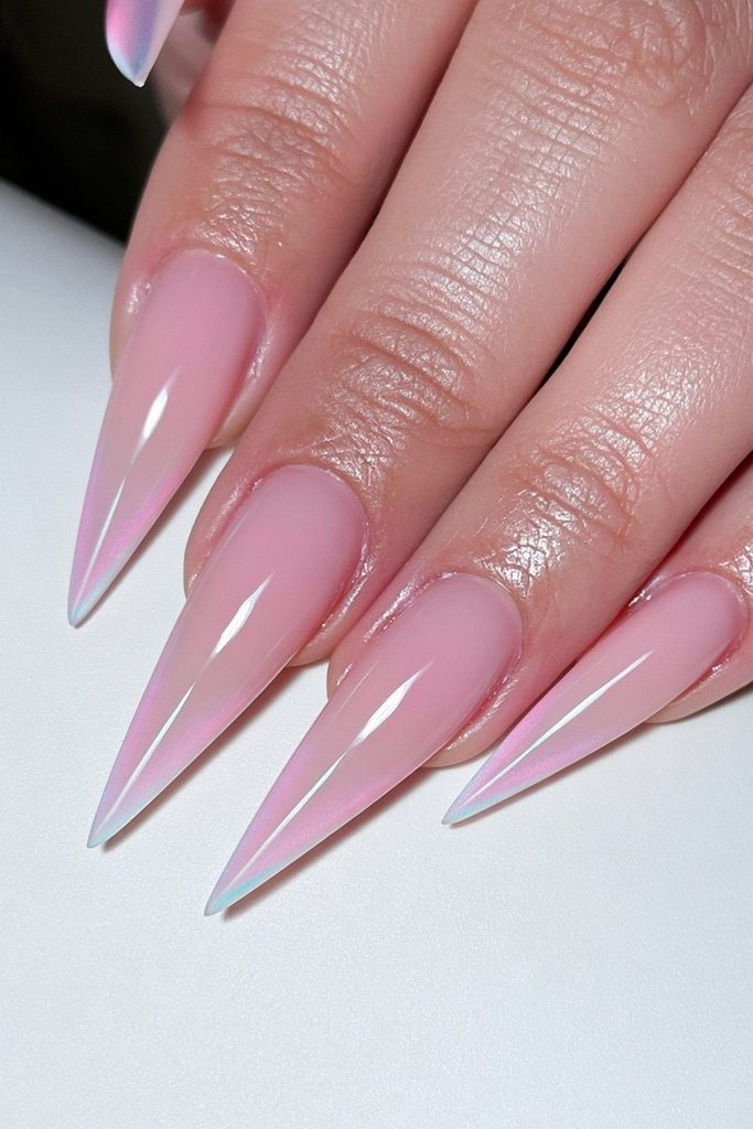 Matte nude stiletto nails with smooth sophisticated finish
