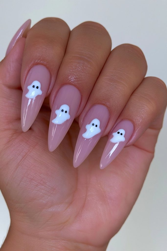 25 Almond Ghost Nails: Effortless Halloween Style 1 Minimalist ghost silhouette on almond nails