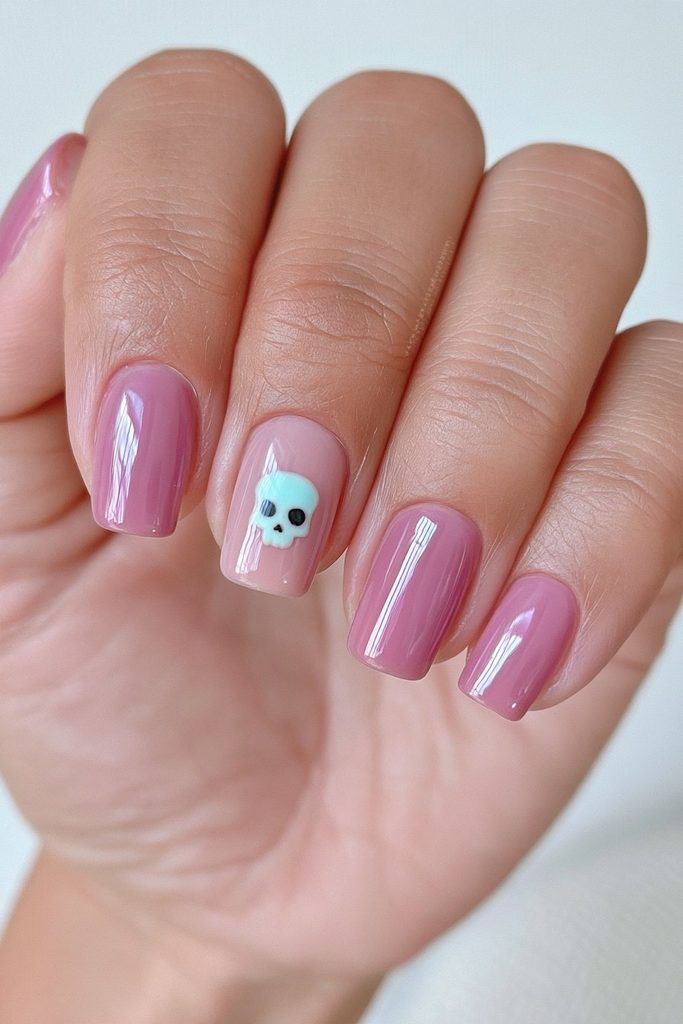 Minimalist skull accent red nails