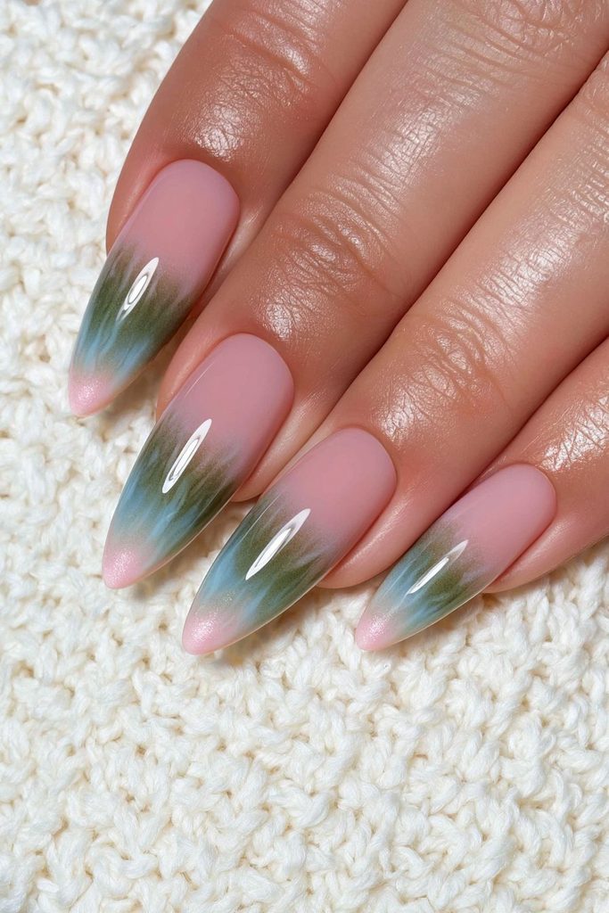 Moody deep green nails with subtle dimensional tonal variation